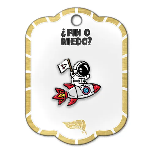 Pin metálico astronauta en cohete